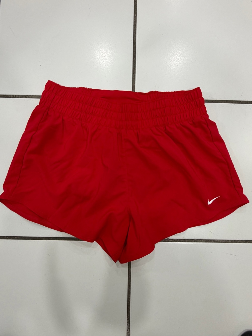 Nike Women's Red Running Shorts with White Swoosh